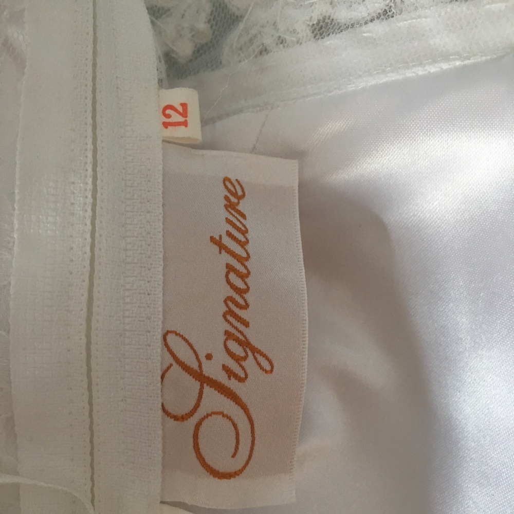Size 12 Signature David’s Bridal wedding gown.